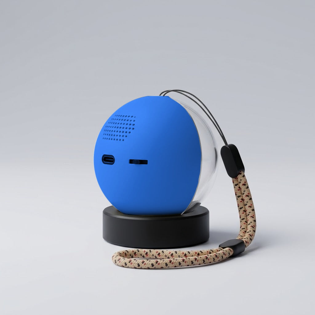 Parte trasera de la esfera Orbalma en color azul, con su botón y la entrada del cable